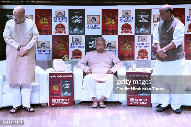 Chief Amit Shah , RSS chief Mohan Bhagwat and Home Minister Rajnath Singh during release two Hindi books Ayodhya ka chashmadeed and Yuddh me Ayodhya...