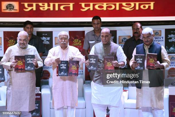 Chief Amit Shah, RSS chief Mohan Bhagwat, Home Minister Rajnath Singh during release two Hindi books Ayodhya ka chashmadeed and Yuddh me Ayodhya...