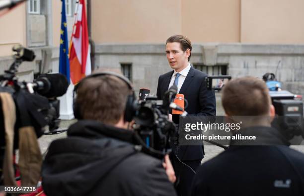 Austrian Foreign Minister Sebastian Kurz speaks with the press ahead of a meeting of the OSCE troika in Villa Borsig in Berlin, Germany, 12 April...