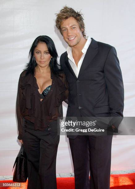 Actress/singer Apollonia Kotero and actor Emmanuel Delcour arrive at the 2007 World Magic Awards at the Barker Hanger on October 13, 2007 in Santa...