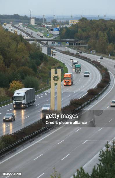 Automobiles driving unhindered from East to West and vice versa along what was once the inner-German border between Marienborn and Helmstedt,...