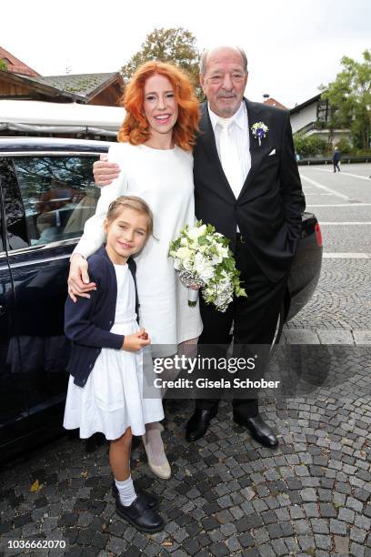 Ralph Siegel and Laura Kaefer pose with daughter Ruby Vivian during their civil wedding at the registry office Gruenwald on September 14, 2018 in...