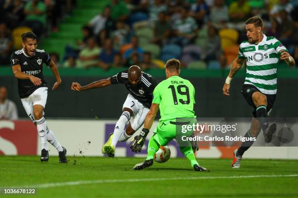 Romain Salin of Sporting CP stops a Innocent Emeghara of Qarabag FK kick during the UEFA Europa League Group E match between Sporting CP and Qarabag...