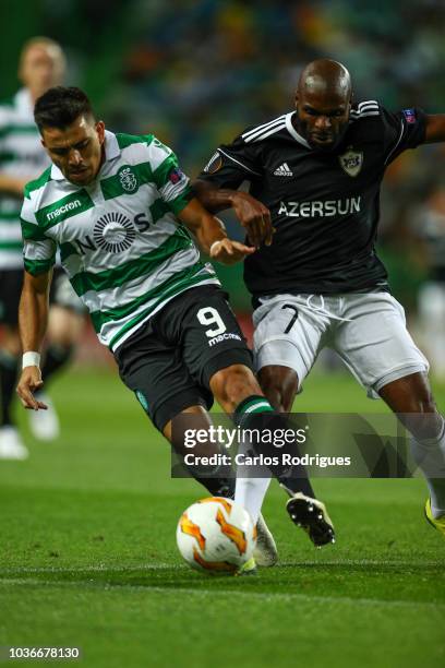 Marcos Acuna of Sporting CP vies with Innocent Emeghara of Qarabag FK for the ball possession during the UEFA Europa League Group E match between...