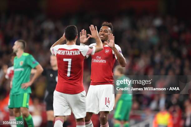 Pierre-Emerick Aubameyang of Arsenal celebrates after scoring a goal to make it 3-0 during the UEFA Europa League Group E match between Arsenal and...