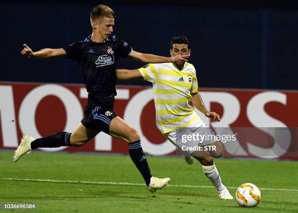 Dinamo's Dani Olmo fights for the ball with Fenerbahce's Ismail Koybasi during the Europa League Group D match between Dinamo Zagreb and Fenerbahce...