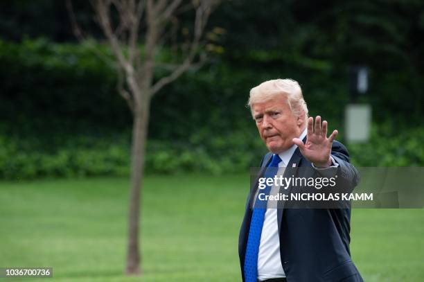 President Donald Trump walks to board Marine One September 20, 2018 at the White House in Washington, DC, as he departs for Las Vegas.