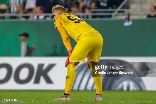 Aleksandr Maksimenko of Spartak Moscow looks dejected during the UEFA Europa League match between Rapid Wien and Spartak Moscow at Allianz Arena on...