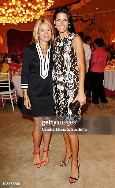 Crystal Lourd and actress Angie Harmon attend the C.H.I.P.S. Spring Luncheon and Fashion Show Honoring Tory Burch at the Beverly Hills Hotel on May...