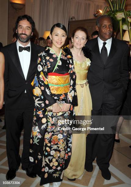 Actors Don McKellar, Yoshino Kimura, Julianne Moore, and Danny Glover attend the "Blindness" opening night dinner at the Carlton Hotel during the...