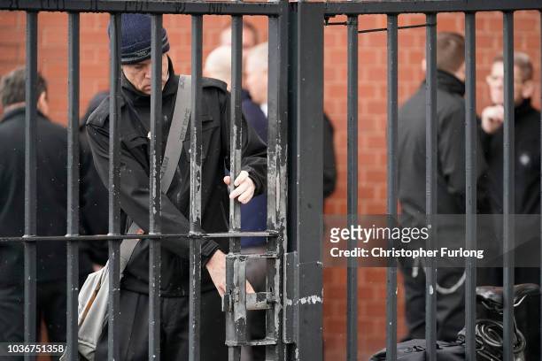 Prison Officers from Manchester Prison gather outside after staging a 'walk-out' on September 14, 2018 in Manchester, England. The Prison Officers...