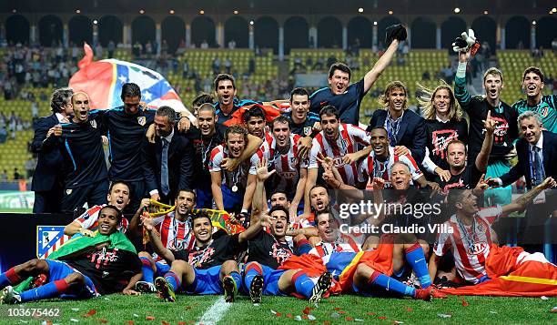 Players of Atletico Madrid celebrate victory after the UEFA Super Cup match between Inter Milan and Atletico Madrid at Louis II Stadium on August 27,...