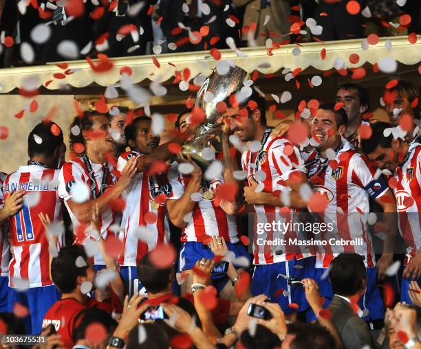 Players of Atletico de Madrid celebrate the victory during the UEFA Super Cup between FC Inter Milan and Atletico de Madrid at Louis II Stadium on...