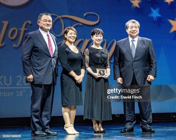 After the presentation, Yasuhiro Yamashita, Ayumi Tanimoto, Mrs Saito and Haruki Uemura line-up for a picture before leaving the stage during the...