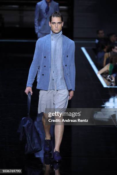 Model walks the runway at the Emporio Armani show during Milan Fashion Week Spring/Summer 2019 on September 20, 2018 in Milan, Italy.