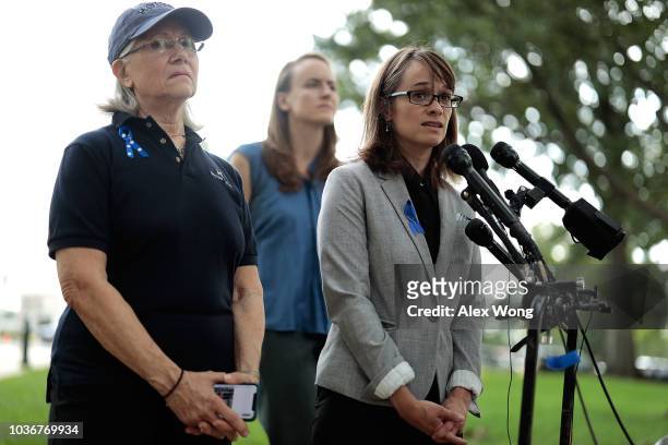 Holton-Arms alumnae Karen Bralove, Sarah Burgess and Alexis Goldstein speak to members of the media after they delievered a signed letter in support...