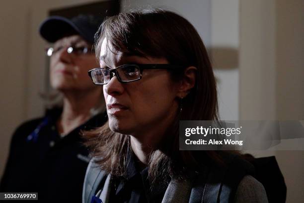 Holton-Arms alumnae Alexis Goldstein speaks to members of the media after she delievered a signed letter in support of Christine Blasey Ford, who has...