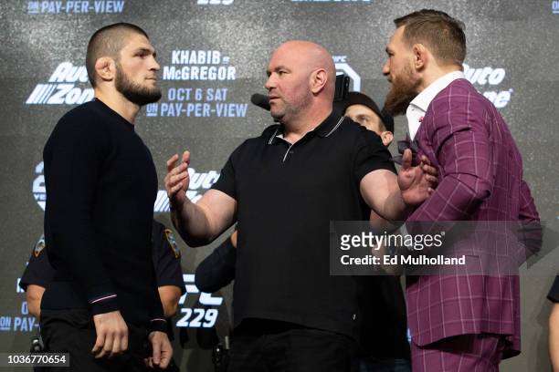 Lightweight champion Khabib Nurmagomedov and Conor McGregor face off after the UFC 229 press conference at Radio City Music Hall on September 20,...