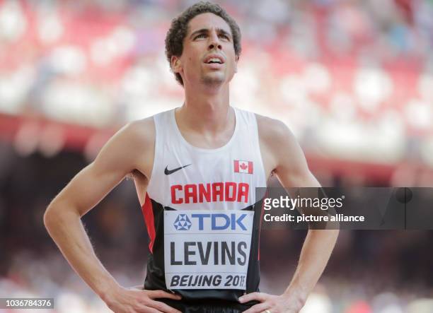 Canada's Cameron Levins competes during the Men's 5000 m Round 1 of the 15th International Association of Athletics Federations Athletics World...