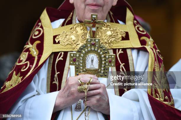 Cardinal of the Roman curia Kurt Koch holds the Relic of the Holy Blood during the so-called 'Blutritt' procession of the Holy Blood in Weingarten,...