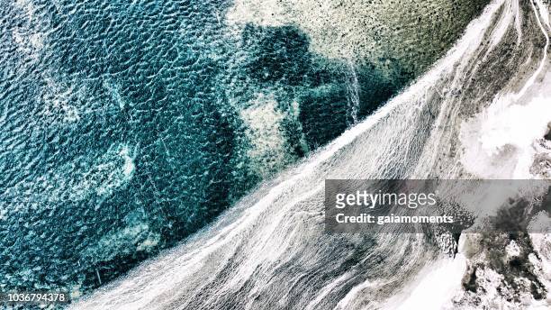 icy water by the shore - winter denmark stock pictures, royalty-free photos & images