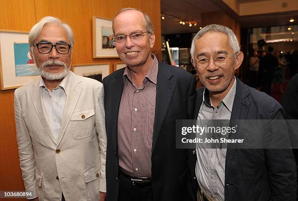 Buena Vista Pictures VP of Marketing Brett Dicker poses with Japanese film maker Hayao Miyazaki and producer Toshio Suzuki at the AMPAS' 14th Annual...