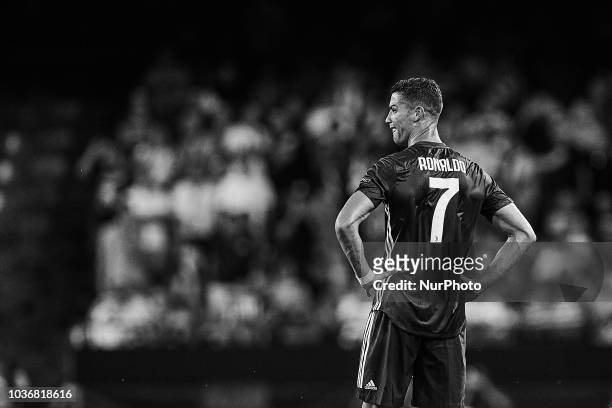 The image has been converted to black and white) Cristiano Ronaldo of Juventus cries after taking a red card during the UEFA Champions League group H...