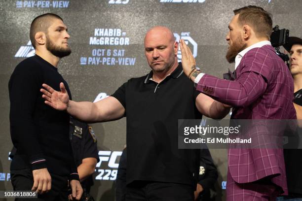 Lightweight champion Khabib Nurmagomedov IL) and Conor McGregor face off after the UFC 229 press conference at Radio City Music Hall on September 20,...