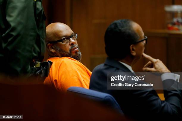 Marion "Suge" Knight, left, shown with his attorney Albert DeBlanc, appears in court pleading no contest to voluntary manslaughter in front of Judge...