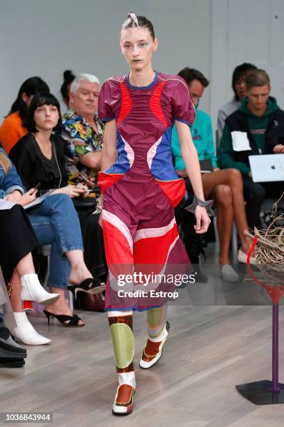 Model walks the runway at the Kiko Kostadinov Show during London Fashion Week September 2018 at XXXX on September 14, 2018 in London, England.