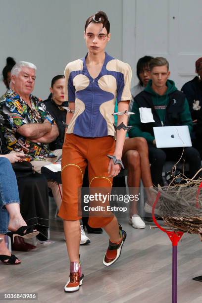 Model walks the runway at the Kiko Kostadinov Show during London Fashion Week September 2018 at XXXX on September 14, 2018 in London, England.