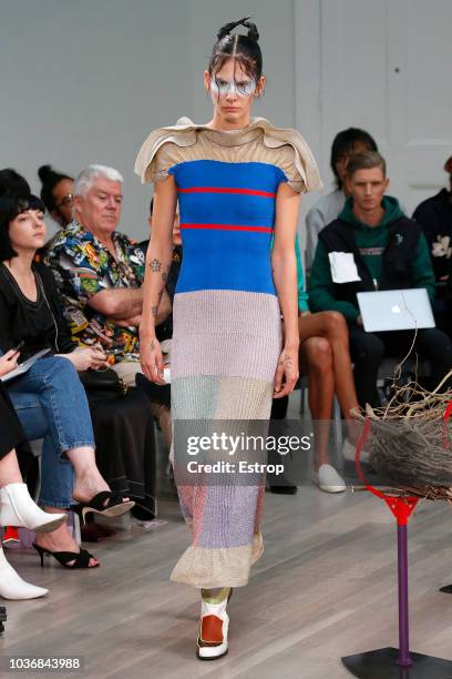 Model walks the runway at the Kiko Kostadinov Show during London Fashion Week September 2018 at XXXX on September 14, 2018 in London, England.