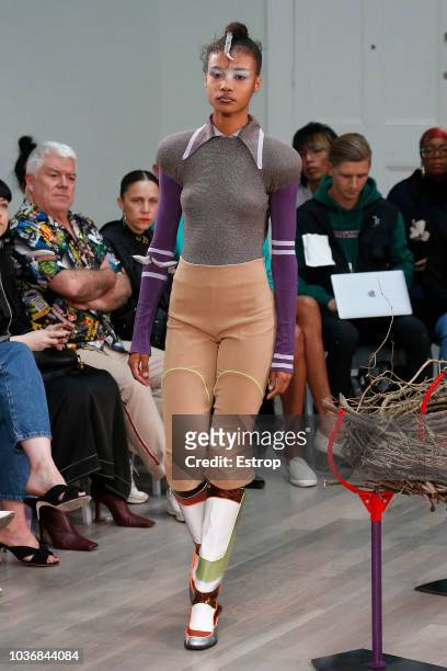 Model walks the runway at the Kiko Kostadinov Show during London Fashion Week September 2018 at XXXX on September 14, 2018 in London, England.