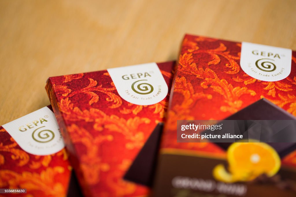 Chocolate with the GEPA company logo can be seen in a shop next to ...