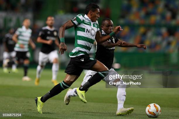 Sporting's forward Raphinha from Brazil vies with Qarabag's forward Innocent Emeghara during the UEFA Europa League Group E football match Sporting...