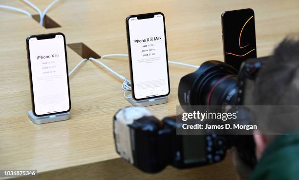 Photographer takes images of the new iPhone at the Australian release of the latest iPhone models at the Apple Store on September 21, 2018 in Sydney,...