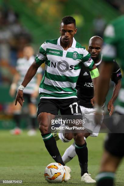 Sporting's forward Nani from Portugal vies with Qarabag's forward Innocent Emeghara during the UEFA Europa League Group E football match Sporting CP...