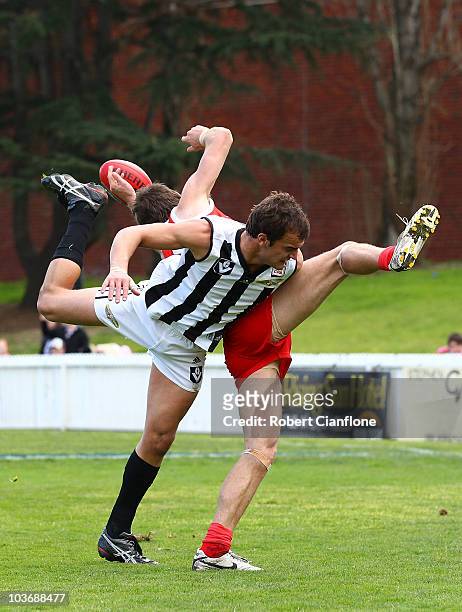 John Anthony of Collingwood challenges Brad Fisher of the Bullants during the VFL second Elimination Final match between the Northern Bullants and...