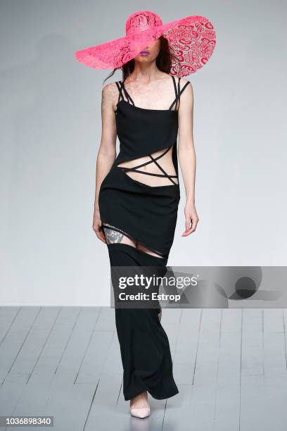 Model walks the runway at the Marta Jakubowski Show during London Fashion Week September 2018 at The BFC Show Space on September 14, 2018 in London,...