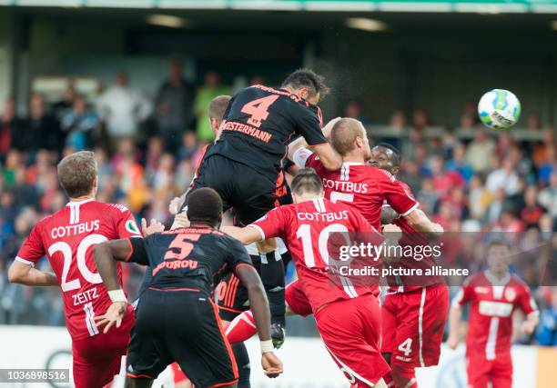 Hamburg's Heiko Westermann scores a 1-1 goal after a corner during the DFB Cup first round match between FC Energie Cottbus and Hamburg SV at the...