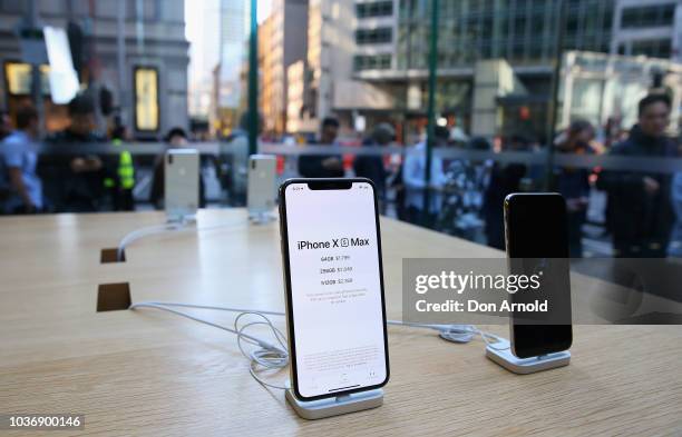 Product is seen displayed as crowds wait in anticipation for the Australian release of the latest iPhone models at Apple Store on September 21, 2018...