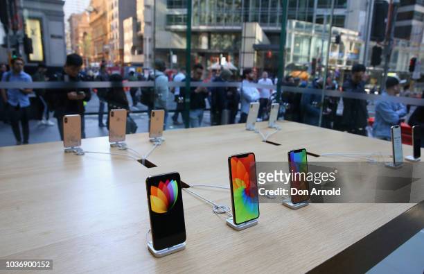 Product is seen displayed as crowds wait in anticipation for the Australian release of the latest iPhone models at Apple Store on September 21, 2018...