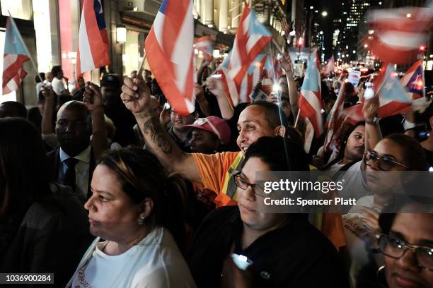 People march to Trump Tower following a service at St. Bartholomew's Church for the one year anniversary of Hurricane Maria which cut through Puerto...