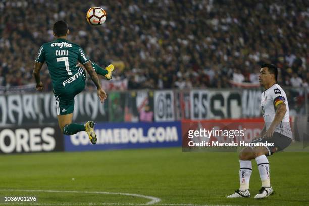 Dudu of Palmeiras kicks the ball in the air during a quarter final first leg match against Colo Colo as part of Copa CONMEBOL Libertadores 2018 at...