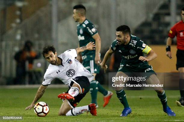 Jorge Valdivia of Colo Colo controls the ball against Bruno Henrique of Palmeiras during a quarter final first leg match between Colo-Colo and...