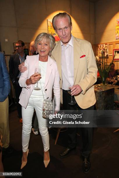 Helga Schmid-Lossberg and Wolfgang Anselmino during a vernissage with artwork by artist Mauro Bergonzoli at the new building otto by the DINZLER...