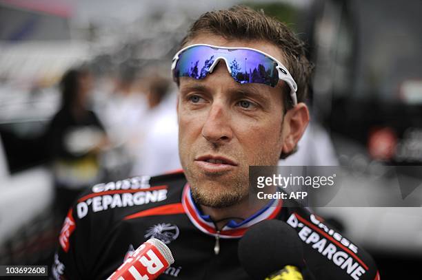France's Christophe Moreau answers a journalist's question on July 9, 2010 prior to the start of the 227,5 km and 6th stage of the 2010 Tour de...