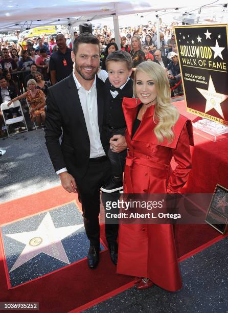 Musician Carrie Underwood, husband Mike Fisher and son Isaiah Michael Fisher at Carrie Underwood Star Ceremony On The Hollywood Walk Of Fame held on...