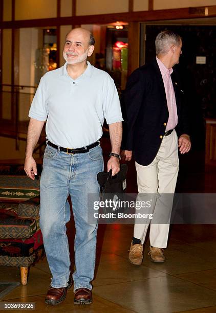 Ben S. Bernanke, chairman of the U.S. Federal Reserve, arrives to the morning session of the Federal Reserve Bank of Kansas City annual symposium...