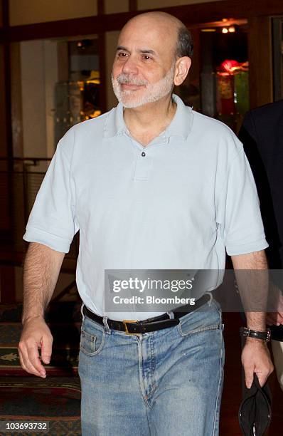Ben S. Bernanke, chairman of the U.S. Federal Reserve, arrives to the morning session of the Federal Reserve Bank of Kansas City annual symposium...
